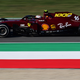 A photo of the 2020 Ferrari F1 car in a special dark red livery to mark the team's 1000th race.